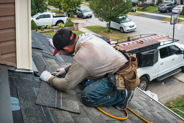 Professional Emergency Roof Repair technician working in Worthington, KY